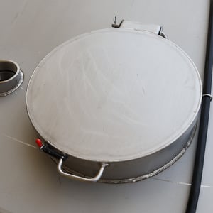 Roof manway assembly for stainless steel flat bottom liquid storage tanks