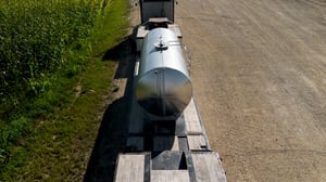 novid stainless steel nurse tank on flat deck trailer-24