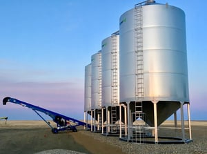 stainless steel hopper bottom dry fertilizer bins with brandt grain auger - novid inc.